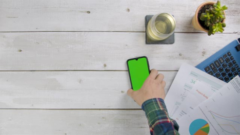 Man-Answering-Phone-Call-with-Green-Screen